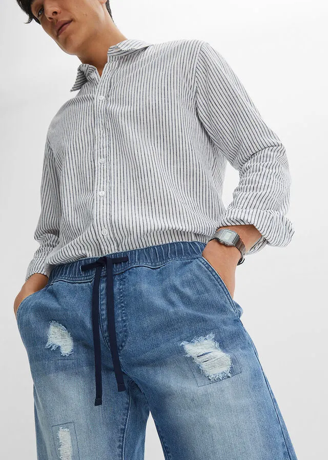 Bermudas vaqueras con cinturilla elástica y corte regular Denim desgastado