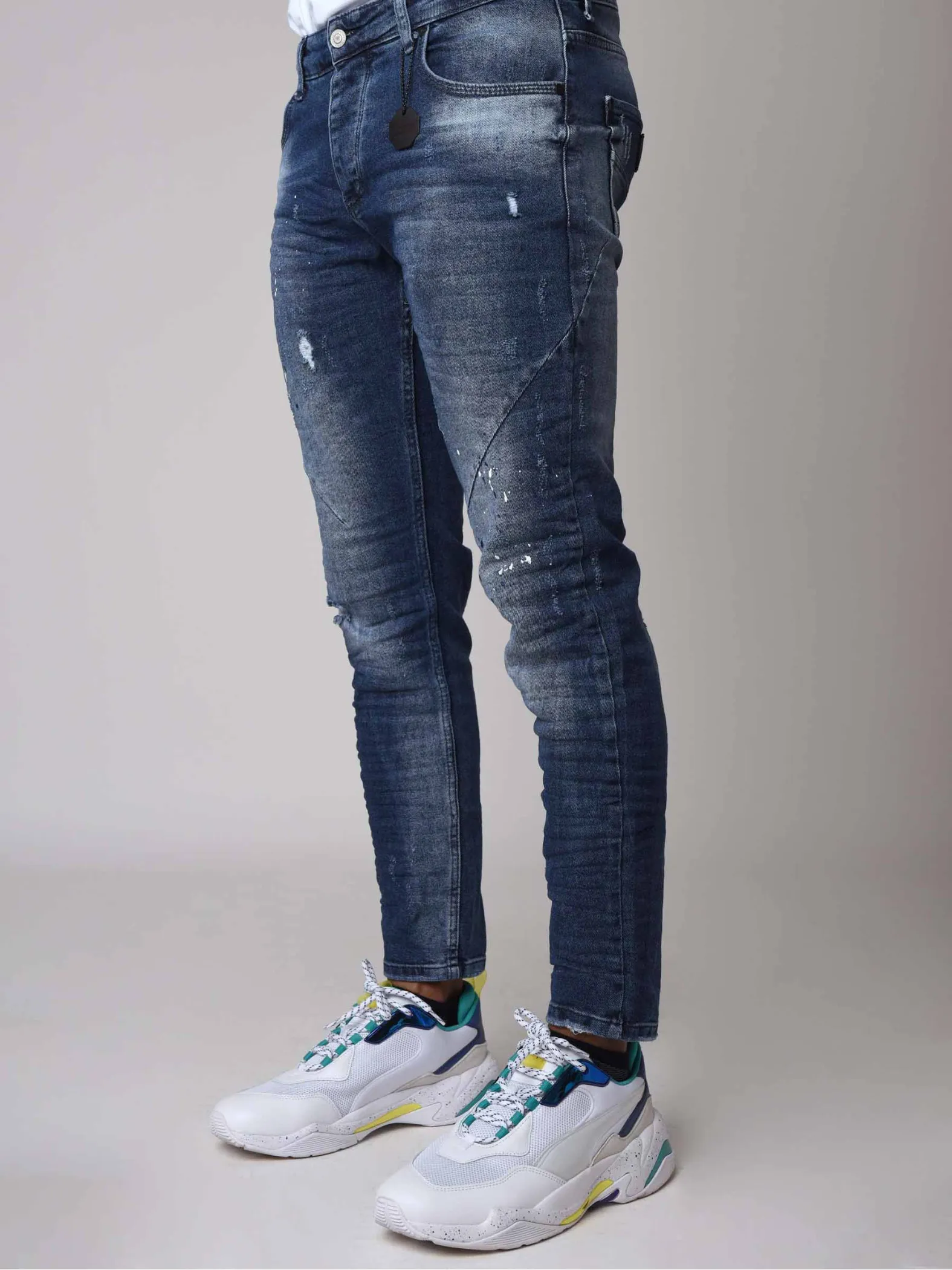 Jeans pitillo azules con efecto desteñido y moteado