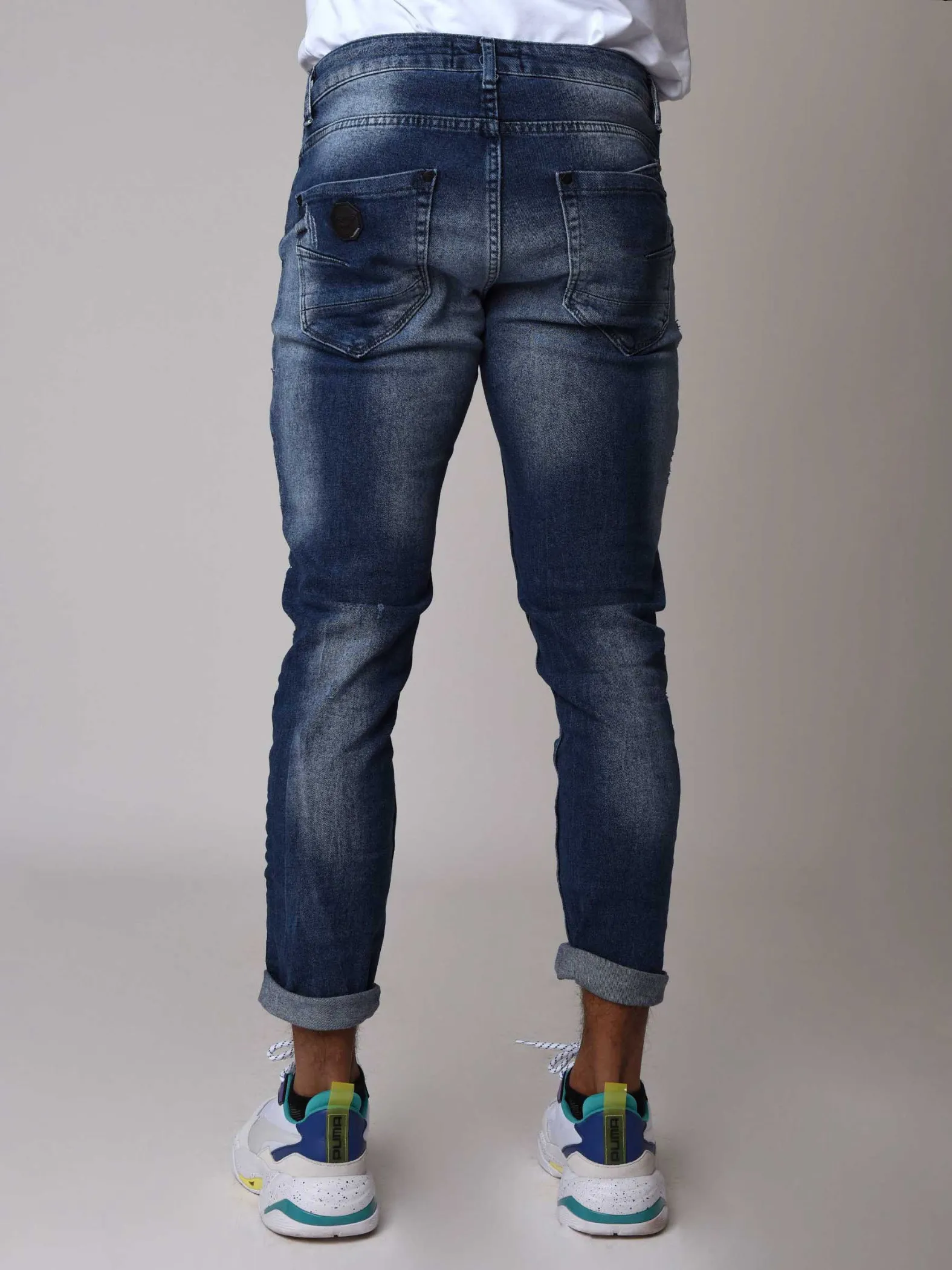 Jeans pitillo azules con efecto desteñido y moteado