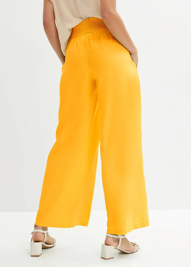 Pantalón Marlene de lino con talle alto y una cómoda cinturilla de nido de abeja Amarillo narciso